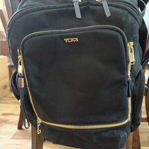 TUMI Black and Gold Celina Backpack